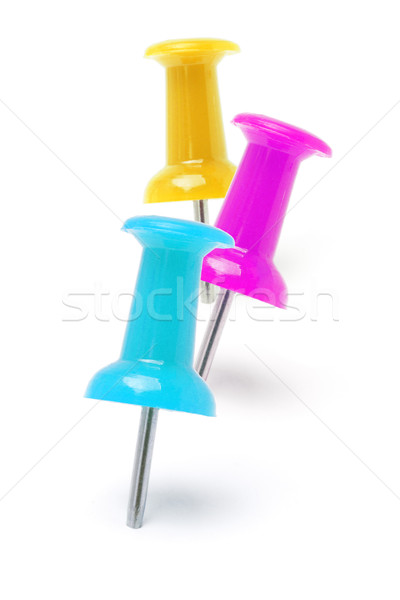 Three colorful push pins Stock photo © dezign56