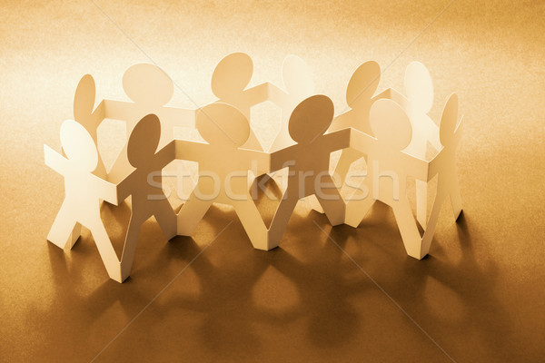 Harmonie twee groepen papier poppen holding handen Stockfoto © dezign56
