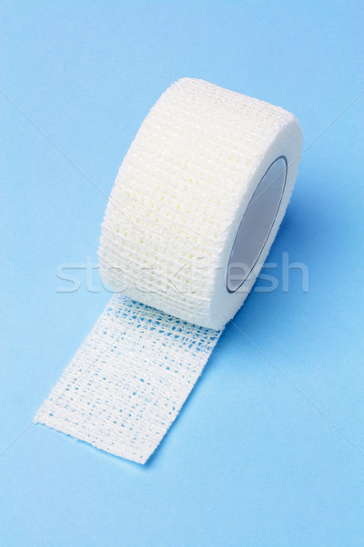 Elastyczny medycznych bandaż biały niebieski tkaniny Zdjęcia stock © dezign56
