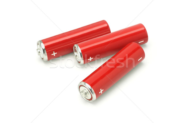 Three AA size batteries Stock photo © dezign56