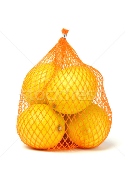 Lemons in plastic netting  Stock photo © dezign56