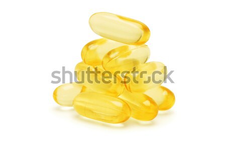 Halolaj kapszulák fehér csoport citromsárga egészséges Stock fotó © dezign56