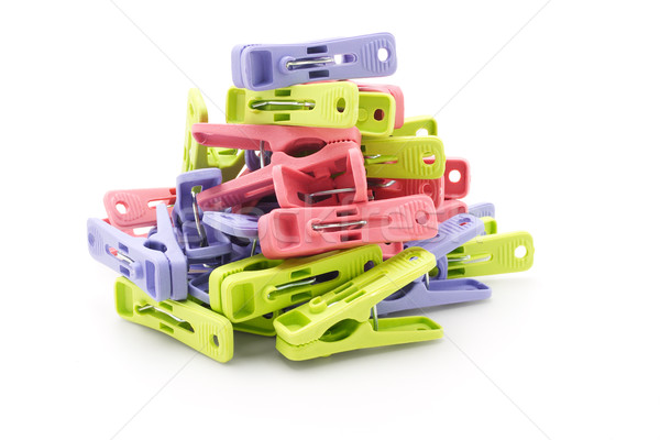 Pile of colorful plastic pegs Stock photo © dezign56