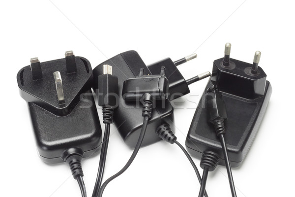 Assorted mobile phone chargers and adapters Stock photo © dezign56