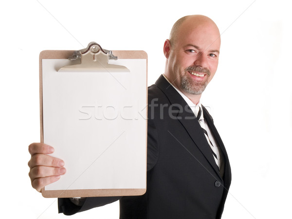 businessman holding clipboard Stock photo © dgilder