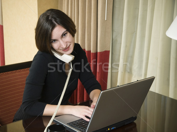 business trip - happy laptop businesswoman Stock photo © dgilder