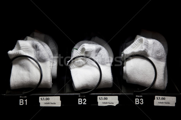 White socks for sale in vending machine at bowling alley Stock photo © dgilder