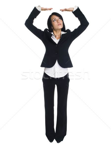 businesswoman - arms overhead holding Stock photo © dgilder