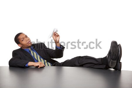 businessman - bored paper airplane Stock photo © dgilder