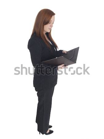 Empresária leitura caderno isolado dia Foto stock © dgilder