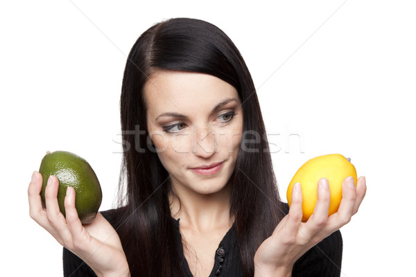 Produce - limes to lemons woman Stock photo © dgilder