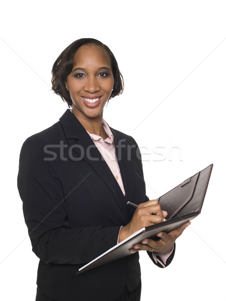 Businesswoman - taking notes Stock photo © dgilder