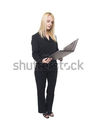 businesswoman - reading notebook Stock photo © dgilder