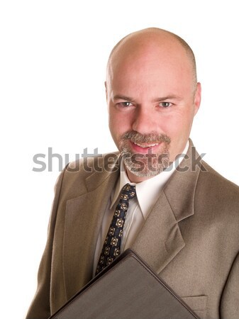 businessman holding notebook Stock photo © dgilder