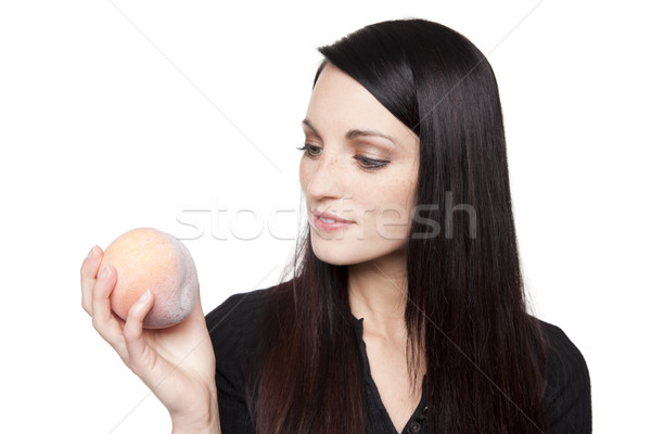 Produce - fruit woman with peach Stock photo © dgilder