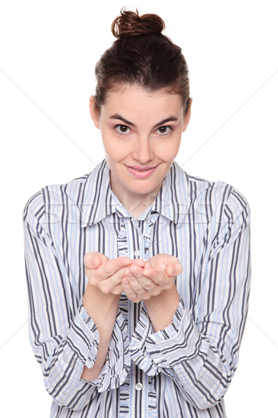 Caucasian woman holding out her cupped hands Stock photo © dgilder