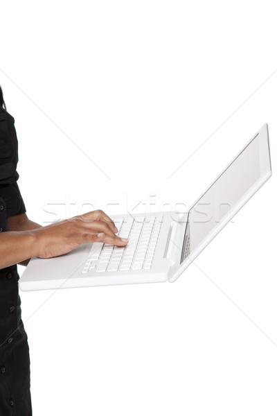 Businesswoman - Latina laptop typing Stock photo © dgilder