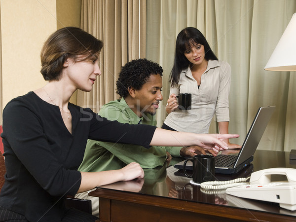 business trip - happy laptop team Stock photo © dgilder