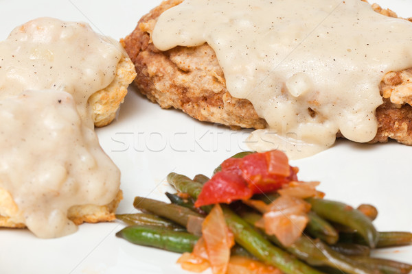 Chicken Fried Seitan with Gravy, Biscuits, and Green Beans Stock photo © dgilder