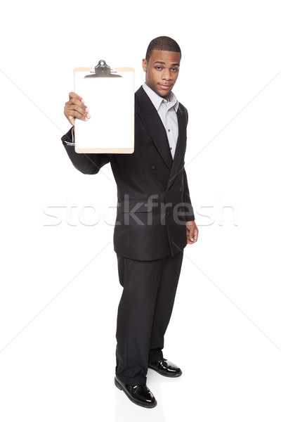 Africano americano empresário isolado branco clipboard Foto stock © dgilder