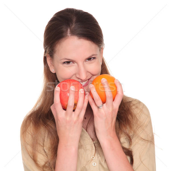businesswoman - apple and orange choice Stock photo © dgilder