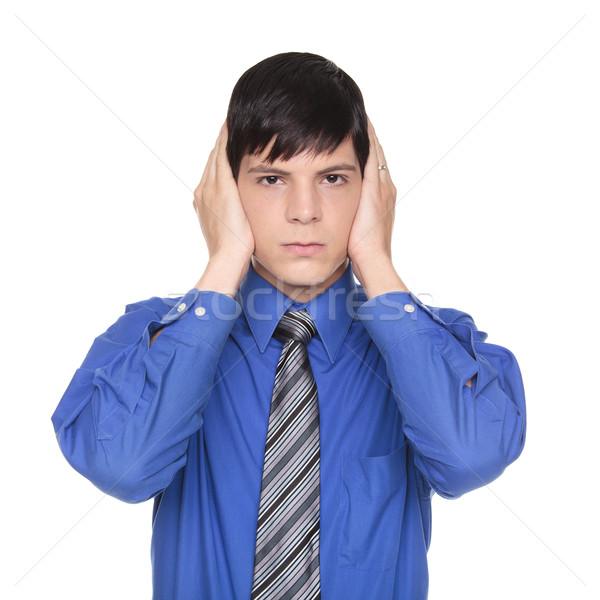 Stock photo: Hear No Evil - Caucasian businessman posing