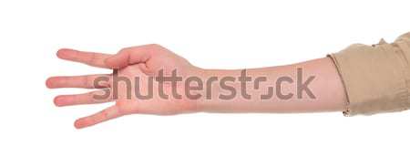 Closeup of arm - hand making number five sign. Stock photo © dgilder
