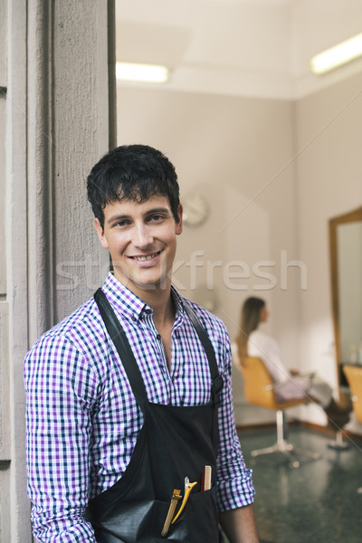 portrait of man working as hairdresser and smiling Stock photo © diego_cervo