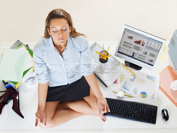 businesswoman doing yoga Stock photo © diego_cervo