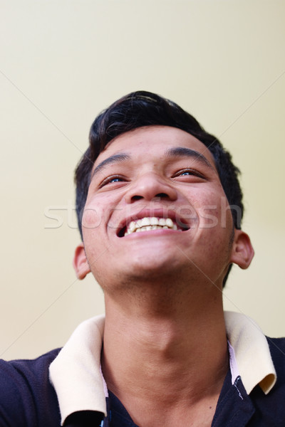 Stock photo: Eyes of happy young asian man looking at camera