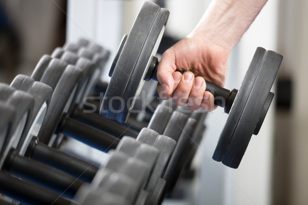Tornaterem közelkép férfi tart súly edzés Stock fotó © diego_cervo