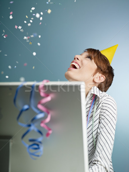 Stock photo: businesswoman with confetti
