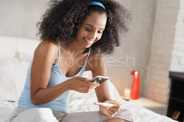 Stock photo: Happy Woman Taking Picture of Pregnancy Test Kit