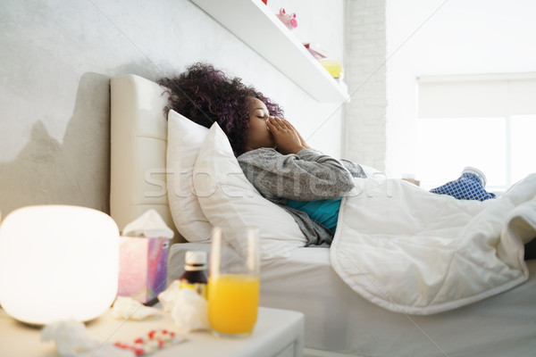 Black Woman With Flu And Cold Holding Ice Bag Stock photo © diego_cervo