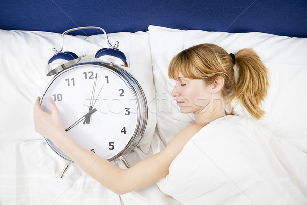 午前 若い女性 ベッド 巨大な ストックフォト © diego_cervo