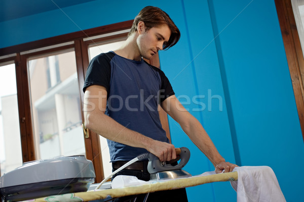 Mann Eisen Hausarbeit Porträt Erwachsenen Stock foto © diego_cervo