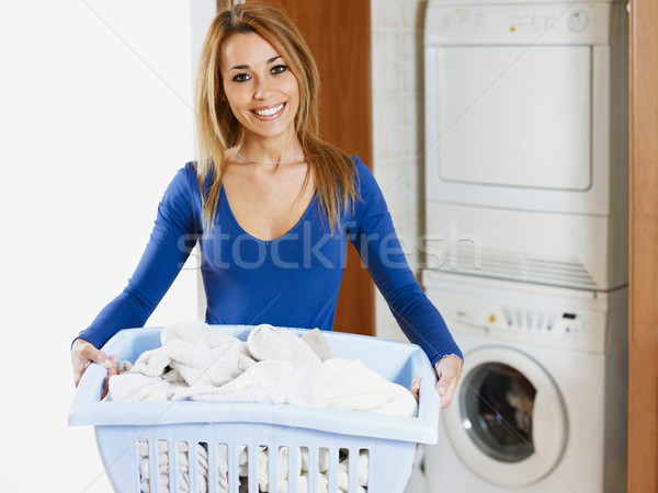 女子 洗衣店 籃 看 相機 商業照片 © diego_cervo