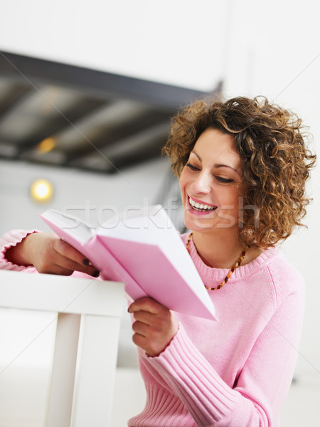 Kobieta czytania książki domu kopia przestrzeń portret Zdjęcia stock © diego_cervo