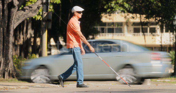 Blind Man Crossing The Road With Cars And Traffic Stock photo © diego_cervo