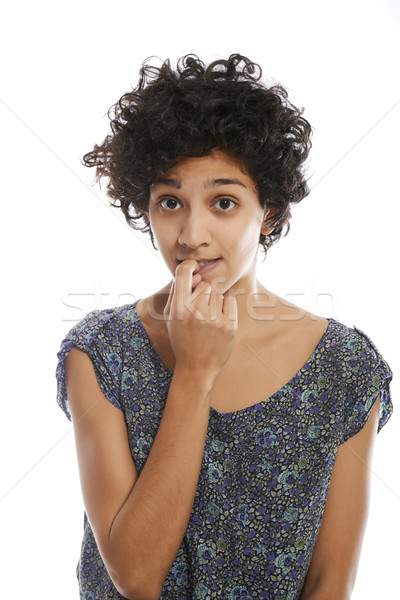 Stock photo: Portrait of confused and uncertain hispanic girl
