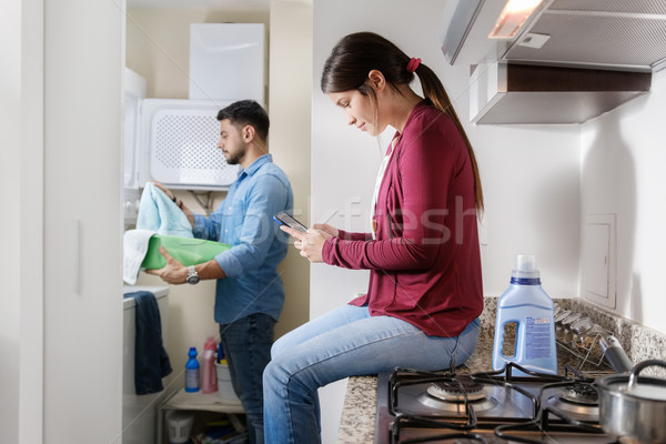 Man And Woman Doing Chores Washing Clothes Stock photo © diego_cervo