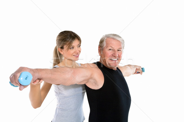 Fitness starszy człowiek młoda kobieta siłowni Zdjęcia stock © diego_cervo