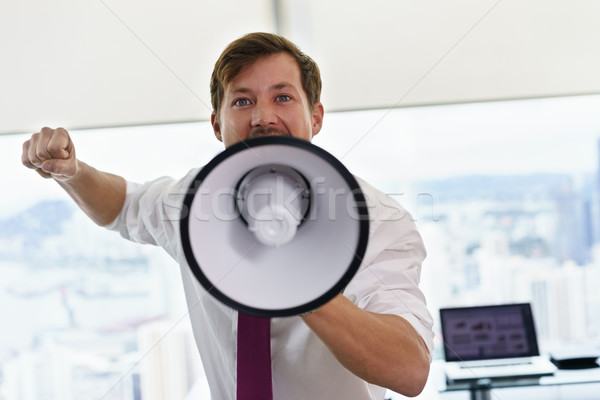 White Collar Worker With Megaphone Fighting For Labor Rights Stock photo © diego_cervo