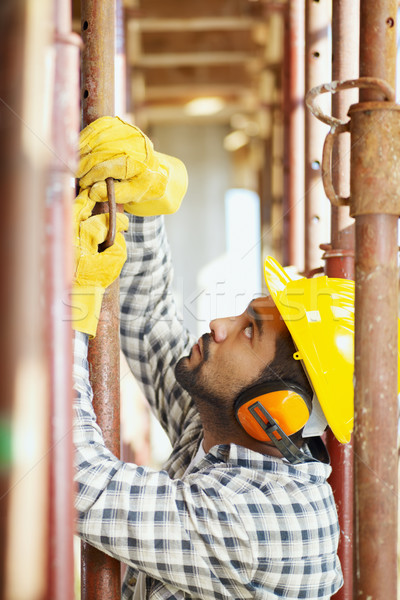 Pracownik budowlany amerykański widok z boku człowiek budowy pracy Zdjęcia stock © diego_cervo