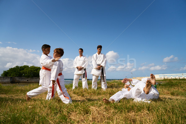 Stock fotó: Iskola · tanárok · gyerekek · karate · lecke · tenger