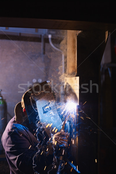 Homem trabalhar soldador pesado indústria manual Foto stock © diego_cervo
