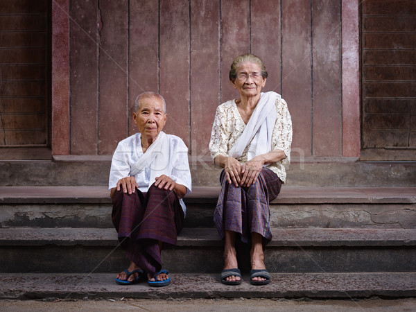 Portrait of two senior asian women looking at camera Stock photo © diego_cervo