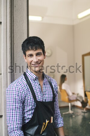 portrait of man working as hairdresser and smiling Stock photo © diego_cervo