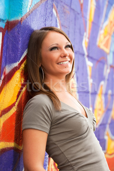 Fiatal nő szeretet dől fal felfelé néz copy space Stock fotó © diego_cervo