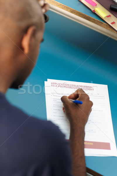 Stock photo: student filling application form